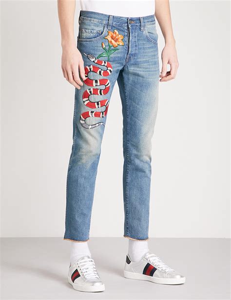 gucci embroidered denim jeans